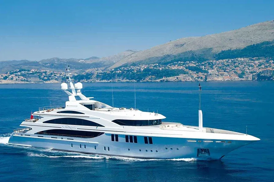 Large white yacht sailing on blue ocean water Large white yacht sailing on blue ocean water