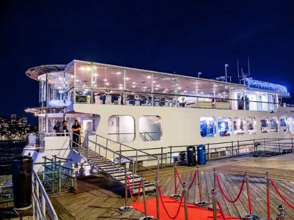 Private yacht dinner with skyline views