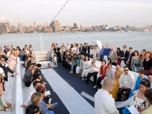 Yacht deck party with city skyline